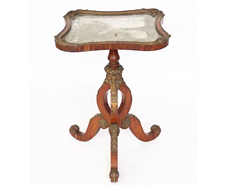 A 19th century satinwood and gesso moulded mirror and stand, the shaped mirror with original plate with a tripod stand with l
