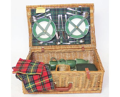 An Optima picnic set in a wicker hamper, with contents, 22cm H x 60cm W x 40cm D