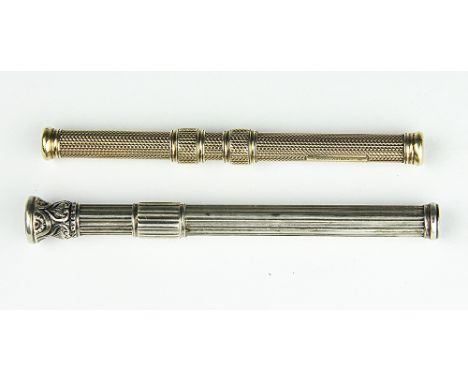 A Sampson Mordan yellow metal double ended retractable pencil / dip pen, with engine turned decoration, and a silver retracta