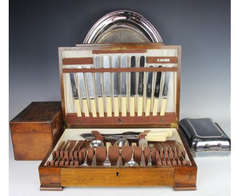 An Art Deco silver plated canteen of cutlery, with two plated oval trays, and entree dish and cover and a 19th century inlaid