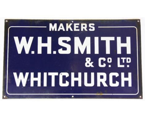 A 'W.H.Smith & Co Ltd Whitchurch' enamel advertising sign, against a blue ground, 35.5cm H x 61cm W