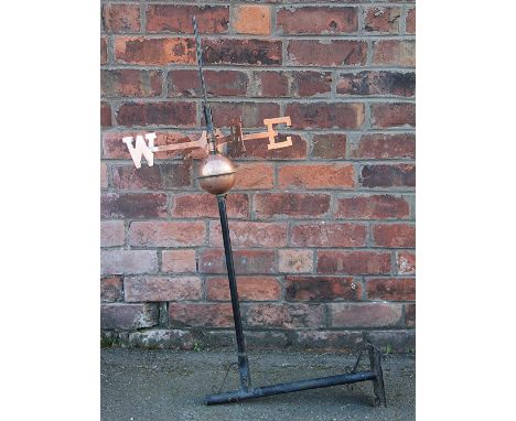 A copper and iron weather vane with bracket, 101cm