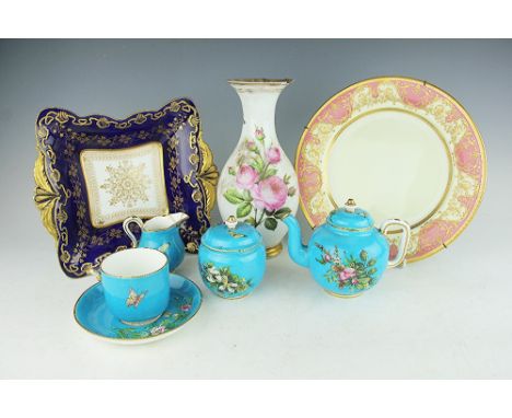 A Victorian Mintons tea service for one, each piece enamelled with floral sprays and butterflies against a vivid turquoise gr