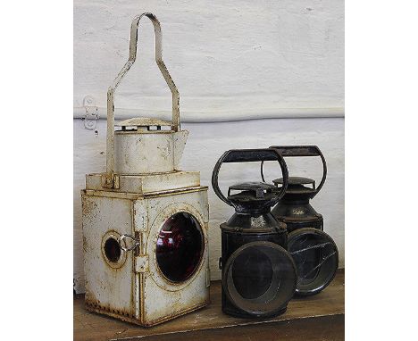 Two British Rail signal lamps, 28cm and a larger white painted signal lamp with red lens, (as found)