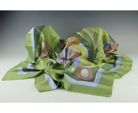 A Hermes 'Golf' silk scarf by Julia Abadie, decorated with golf clubs and balls in a spiral pattern, 87cm x 90cm 
