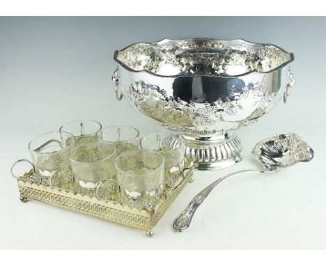 A large silver plated punch bowl, the pedestal bowl with embossed floral garlands and lions mask ring handles, 32cm diameter 