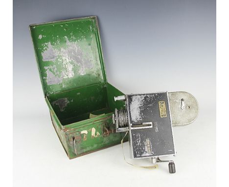 A Vintage Setright ticket issuing machine 'serial No.43228', the machine baring makers plaque, with original tin box, a vinta
