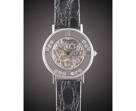 AN 18K SOLID WHITE GOLD CHOPARD "HAPPY SPORT" SKELETONISED WRIST WATCHCIRCA 1990sMovement: Manual wind, skeletonised & engrav