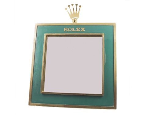 A GILT METAL & ENAMEL ROLEX MIRRORCIRCA 1950sGilt metal surround with green enamel & gilt Rolex lettering, folding stand to b