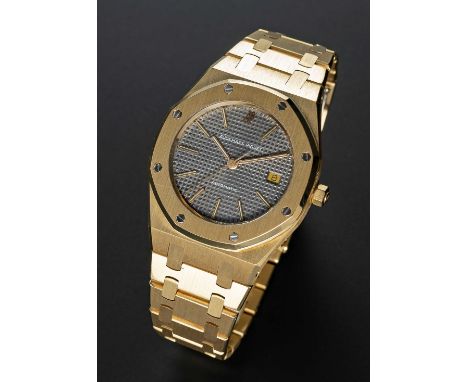 A FINE GENTLEMAN'S 18K SOLID YELLOW GOLD AUDEMARS PIGUET ROYAL OAK AUTOMATIC BRACELET WATCHCIRCA 1990s, REF. 4100 BA WITH GRE