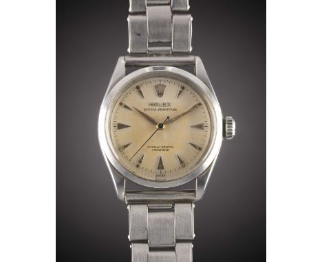 A GENTLEMAN'S STAINLESS STEEL ROLEX OYSTER PERPETUAL BRACELET WATCHCIRCA 1955, REF. 6284 WITH SILVER "HONEYCOMB" "OCC" DIAL &