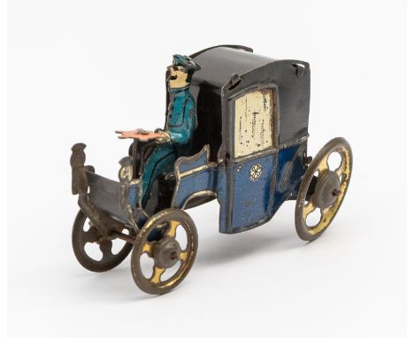 Tinplate: An early 20th century, lithographed tinplate penny toy motor car. Made in Germany, stamped with a flower (possible 