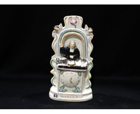     A Staffordshire Pottery Portrait Group Of Wesley                                
