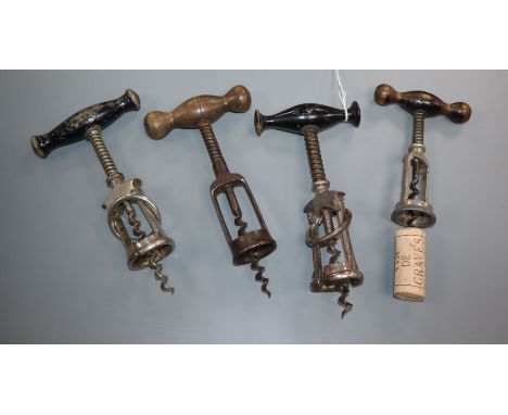 Four German coiled spring steel corkscrews, late 19th, early 20th century two with split barrels (one stamped D. R. patent)