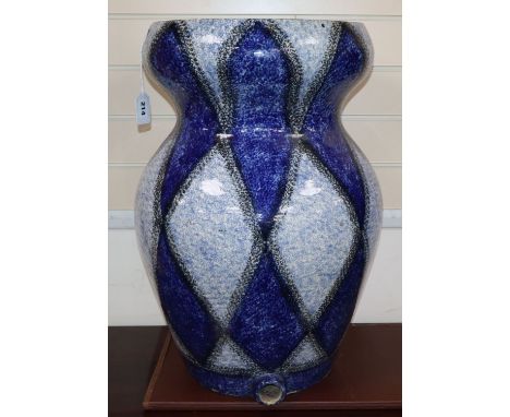 A large ceramic water filter height 61.5cm