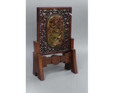 A Chinese green and russet jade mounted wood model of a table screen, early 20th century Height 19cm