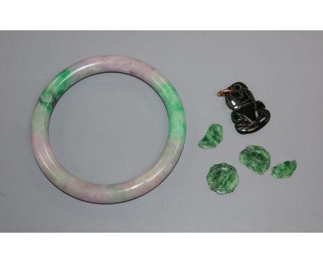 A Chinese jade bangle and two small jade carvings