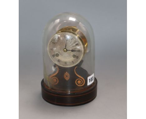 A mid-19th century French mantel clock by Paul Garnier, Paris, of skeleton drum form with silvered Roman dial, on turned wood