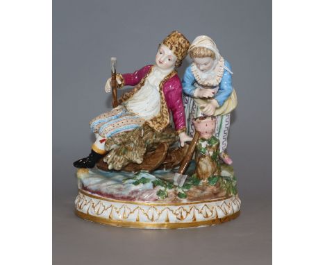 A Meissen porcelain group emblematic of Winter, modelled as a boy seated on a sledge and a girl warming her hands at a brazie