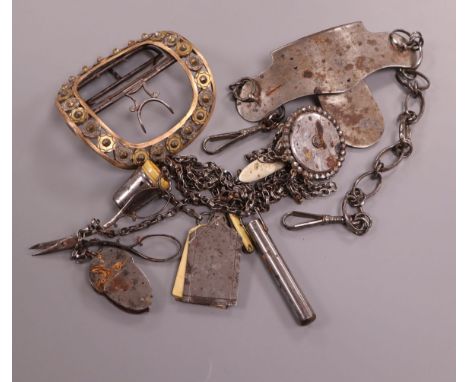 An early 19th century steel and marcasite chatelaine with tools, a similar large buckle and a steel hanger