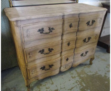 SERPENTINE COMMODE, 1920s Louis XV style bleached oak with three long drawers on cabriole supports, 90cm H x 115cm x 49cm.