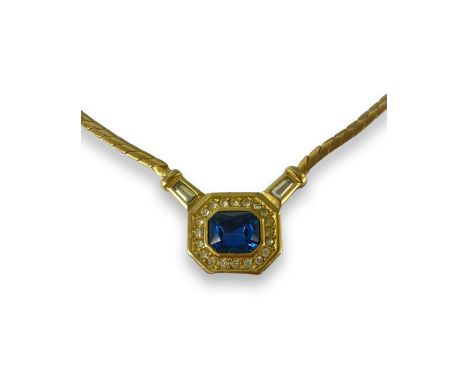 Christian Dior Blue Crystal and white Stone Pendant and Gold Tone Chain Weighing 19.59 grams Measuring 41cm in length on last