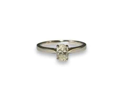 Brand New Ex-Display 18ct White Gold Diamond Solitaire Ring comprising of a  0.65ct Oval Cut Diamond Weighing 2.7 grams Size 