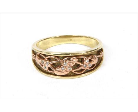 A 9ct gold Clogau 'Tree of Life' diamond ring, the tapered yellow gold head with applied rose gold vine motifs, rub set with 