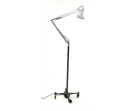 A mid 20th century anglepoise lamp on castors