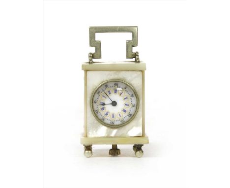 A French mother-of-pearl miniature clock , stamped 'Brevet 33817', cased, 6cm high overall