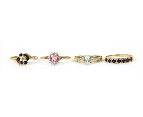 Four 9ct gold rings, to include a pink spinel and diamond cluster ring, Birmingham 2010, finger size R ½, a diamond and sapph