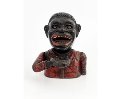 A cast iron mechanical money bank, John Harper &amp; Co, circa 1900, modelled as black man with red jacket, stamped Made in E