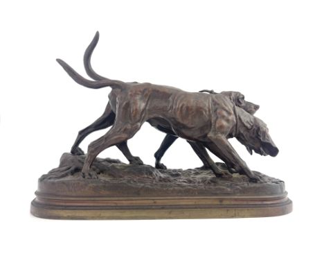 Alfred Dubucand (French, 1828-1894), two Bloodhounds on the scent, signed, bronze, 23cm high, 28cm wide 