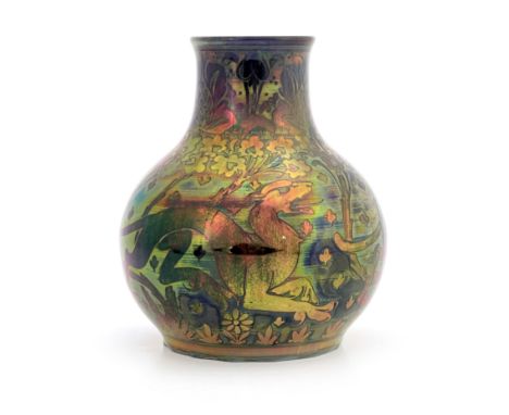 Charles Cundall for Pilkington, a Royal Lancastrian lustre vase, 1910, bulbous form, painted with bronze iridescent leopards 