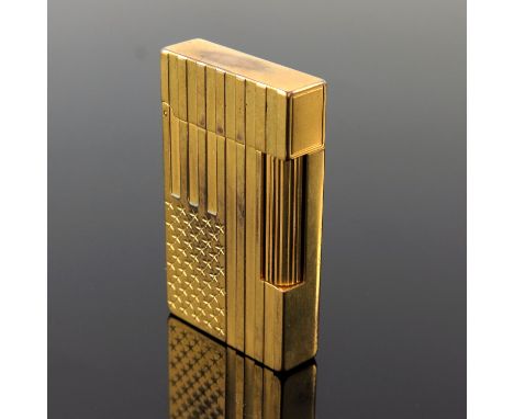 S T Dupont, a gold plated American Flag lighter, relief moulded stars and stripes to each side, 6cm x 3.5cm