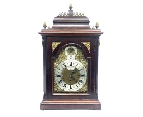 Windmills, London, a George II bracket clock, mahogany chamfered case, caddy top with brass pineapple finials, arched brass d