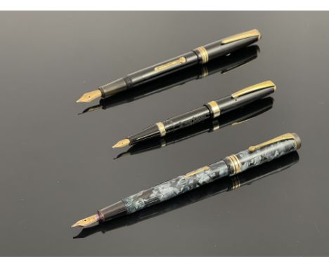 Conway Stewart, a 388 fountain pen, blue silver marbled, a 68 black fountain pen and an Onoto lever pen, 14 carat gold nibs (
