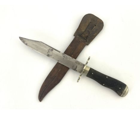 An early 20th century Bowie knife, 6.5 inch blade stamped George Butler &amp; Co Trinity Works Sheffield England, steel cross