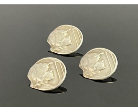 Kate Harris for William Hutton, a set of three Arts and Crafts silver buttons, Birmingham 1905, circular, cast with a child's