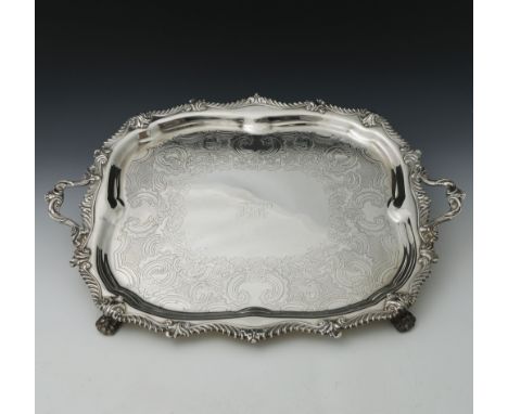 Gorham &amp; Co, a large plated twin handled sideboard tray, Rococo design with a serpentine and scroll border, scroll engrav