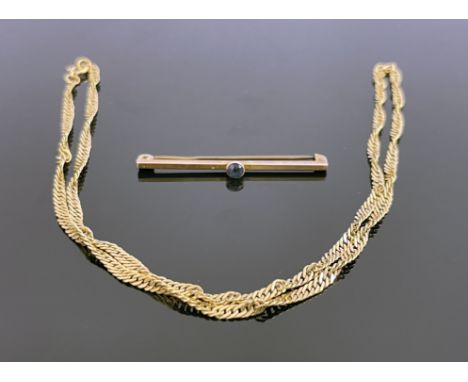 A 9ct gold chain, together with a 9ct gold and sapphire tie pin, 7.1g (2)