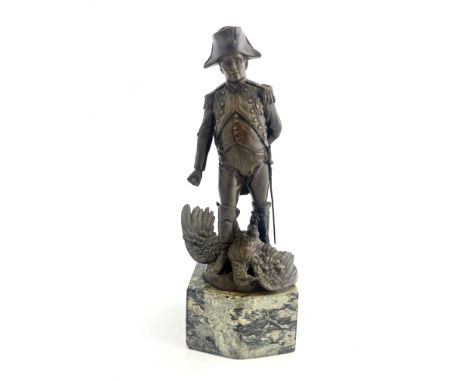 A 19th century bronze figure of Napoleon Bonaparte, signed Jitze, modelled in military uniform standing on an eagle, on a gre
