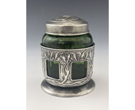 Rex Silver for Liberty and Co., a Tudric Arts and Crafts pewter and green glass tea caddy, model 0861, the James Powell and S