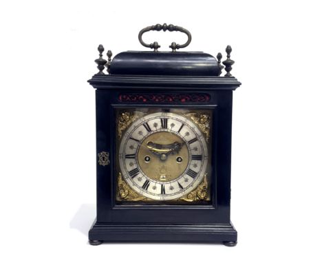 Paul Beauvais, London, a George II bracket clock, ebonised case, caddy top with brass swing handle and urn finials, square br