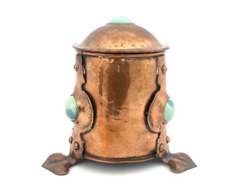 An Arts and Crafts copper and Ruskin cabochon tea caddy, in the style of the Birmingham Guild, cylindrical beaten form with t