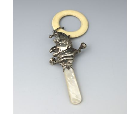 An Elizabeth II novelty silver baby's teething rattle, W.H. Collins &amp; Co, Chester 1959, formed as Mr Punch, bone ring, mo