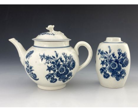 A Caughley blue and white teapot and tea caddy, C mark, circa 1780, Three Flowers pattern to each, the lid with relief moulde
