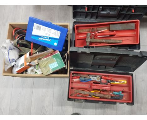 A quantity of tools in two tool boxes and another.