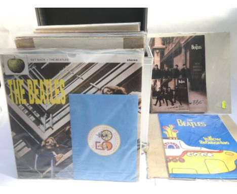 A collection of Beatles and solo press packs including 'Get Back', 'White Album', 'Imagine', 'Flaming Pie' and others. Some w