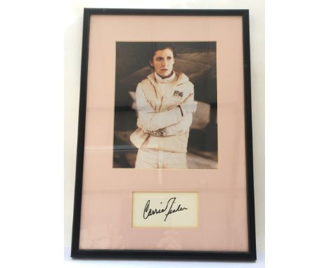 A framed and glazed autograph and colour print of Carrie Fisher as Princess Leia in Star Wars - The Empire Strikes Back.